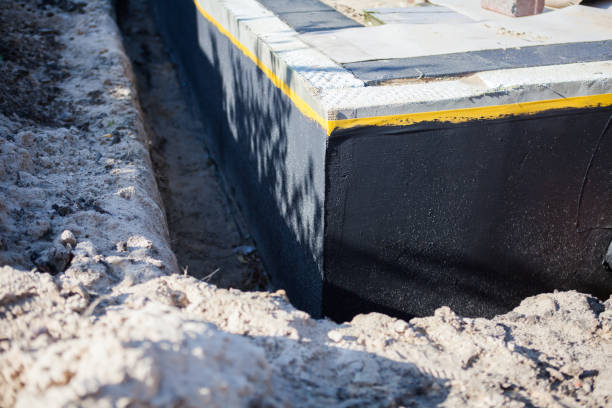 Professional Exterior Waterproofing technician working in Orleans, IN